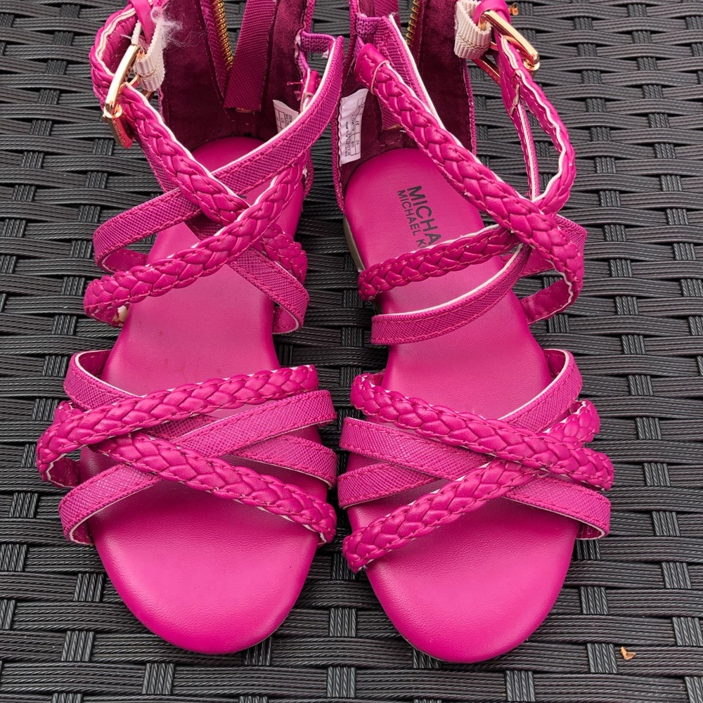 Michael Kors pink sandals.